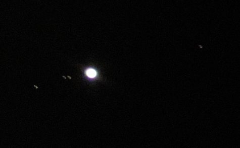 Photo of Jupiter and the four Galilean Moon (from left to right: Ganymede, Europa, Io, and Callisto) taken during the Astronomy Club meeting. Photo by Ellie Shin.