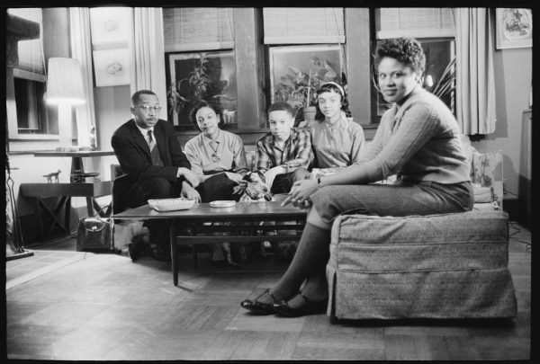 The Clarks, their two children, and Minnjean Brown in their living room on Pinecrest Drive in February 1958. 